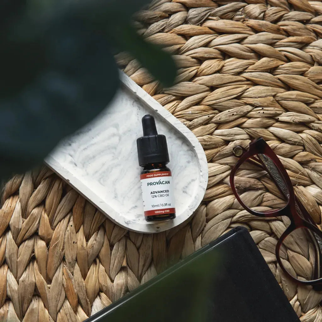 Bottle of Provacan Advanced 12% CBD Oil laid on a white tray